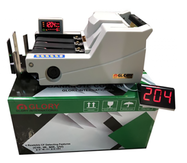 Máy đếm tiền GLORY dạng máy nằm đang được sử dụng phổ biến tại kho bạc nhà nước và ngân hàng Máy đếm tiền GLORY dạng máy nằm đang được sử dụng phổ biến tại kho bạc nhà nước và ngân hàng